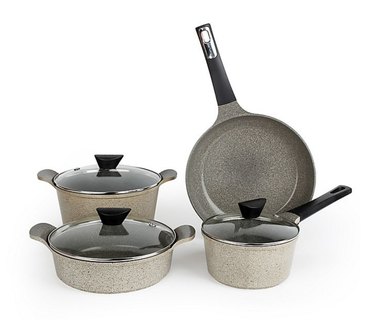 Marbled ceramic cookware set with black handles on white background