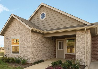 Fiber cement siding designed to look like brick.