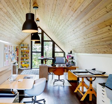 bonus room above garage idea with wood adorned ceiling and white walls for office