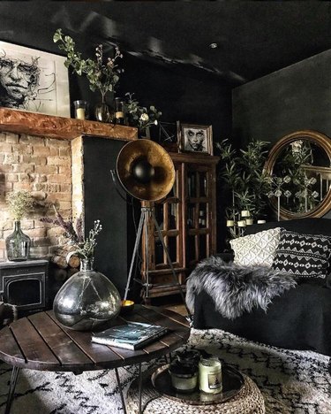 black living room color idea with rustic accessories