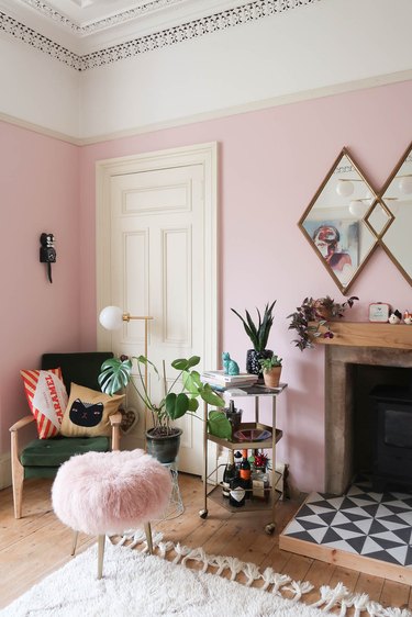 pink living room color idea with glamorous styling