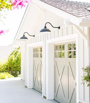 double set of craftsman style garage doors with farmhouse charm