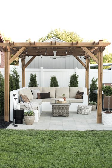 Wood contemporary pergola with outdoor furniture