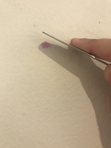 filling a nail hole