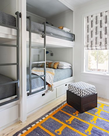 built in bunk beds accented with bold patterns