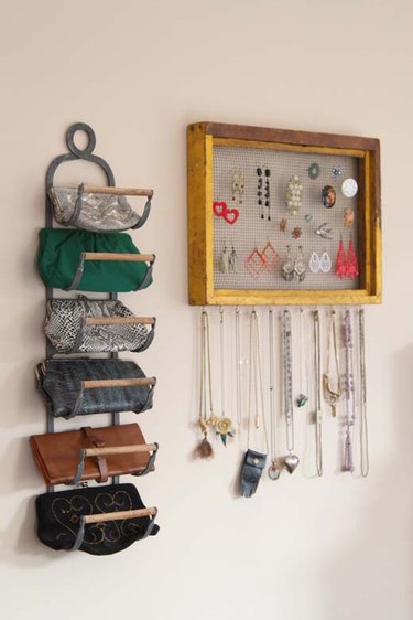 Purses in a wine rack