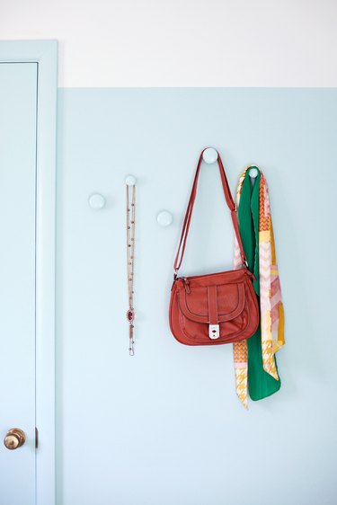 Purse hanging from a doorknob