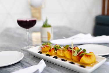 Close-up of a seasaonl summer dish served at Canon, a restaurant in East Sacramento