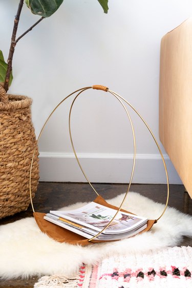 DIY Magazine Rack using gold macrame hoops and leather