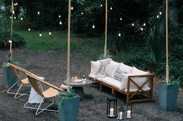 outdoor living room with string lights