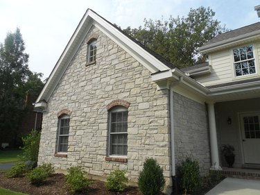 Faux stone siding on addition.