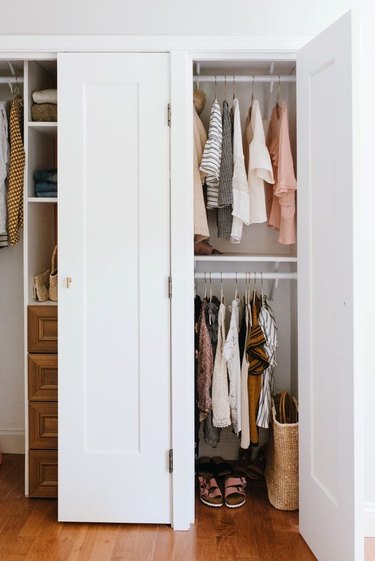bedroom closet idea for small space with hanging clothes and drawers