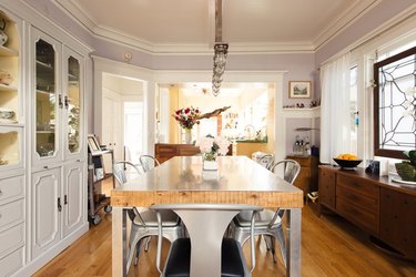 dining room space in Craftsman home with wooden table