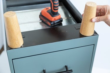 add wood legs to filing cabinet