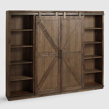 World Market farmhouse furniture with bard door book case