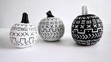 Black and white painted pumpkins