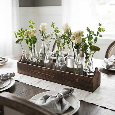 Kirkland's farmhouse decor with wood crate and vase set on dining room table