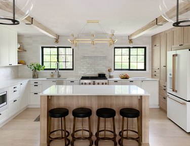 kitchen with white subway tile backsplash and oak hardwood floors