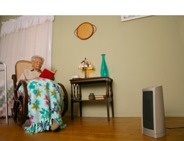 Reading by the space heater.