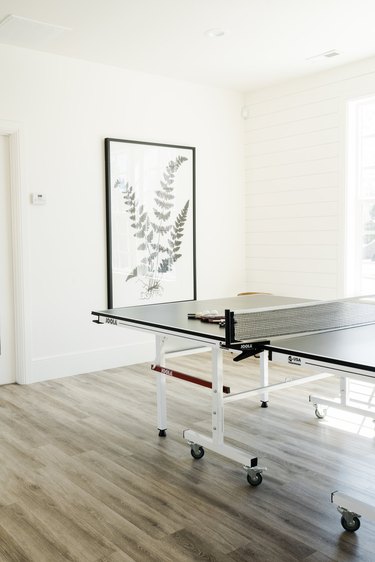 minimal garage game room ideas with botanical wall art