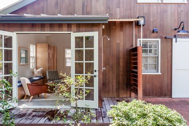 Shaker-inspired barn with an outdoor shower in Los Angeles