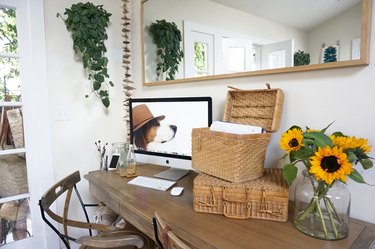 vintage woven basket storage in bedroom office