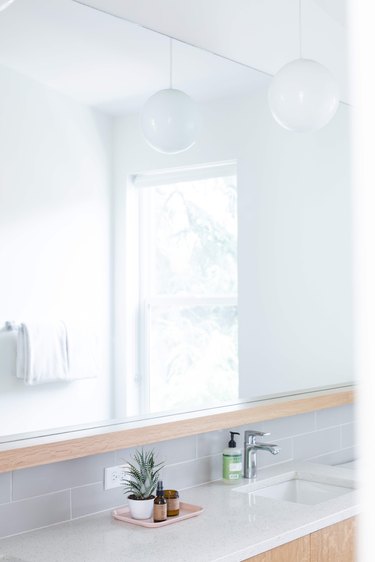 Minimalist bathroom in Meakins home