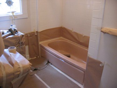Bathroom prepared for reglazing the tub.