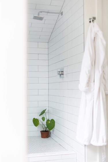 White tile shower in Meakins home