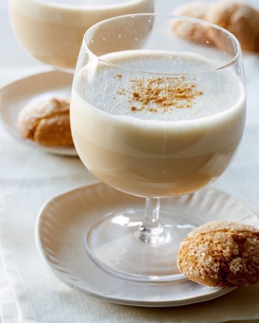 two drinks and cookies on plates