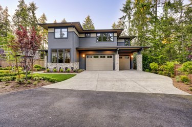 New construction home with wood and stone siding