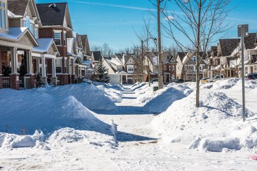 Sidewalks near houses cleared of snow by residents