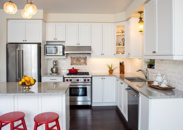 Professionally designed new white kitchen with touch of retro style