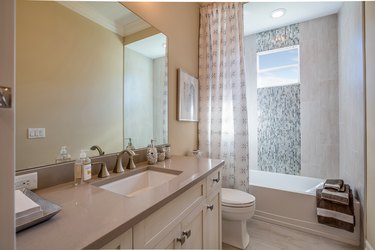 Well planned bathroom with two handle faucet