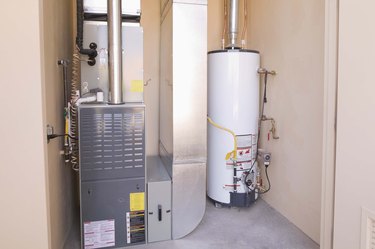 Furnace and water heater in basement of house