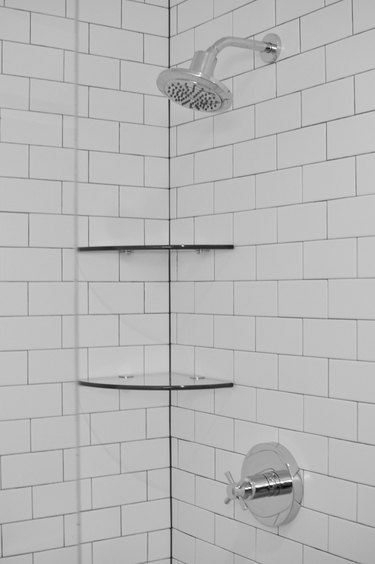 White Subway Tiles with Shelves in Shower