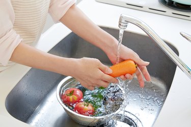 close up of washing the vegetables