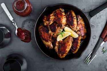 Roast chicken wings in cast iron pan