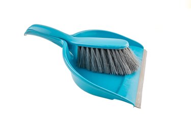 Blue dustpan and a brush.