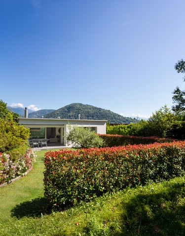 House with garden by day in the middle of summer in Switzerland