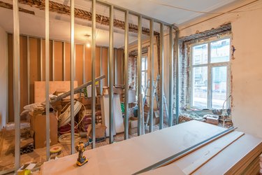 Interior of apartment during on the renovation and construction ( making wall from gypsum plasterboard)