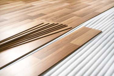 Laminated flooring tiles