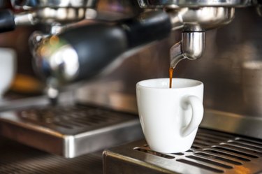 Espresso machine preparing cup of espresso