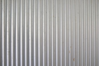 Old Background texture Aluminum metallic corrugated fence