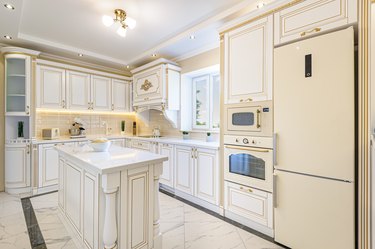 Neoclassic style luxury kitchen interior with island