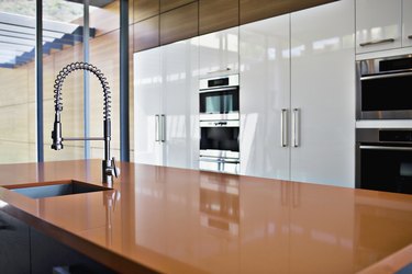 Interior of modern kitchen with spray nozzle