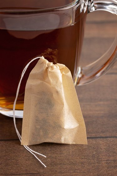 A Self Filled Tea Bag wtih a Cup of Herbal Tea