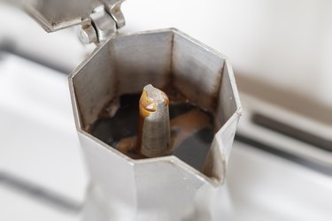 Coffee coming up in an old Italian coffee maker