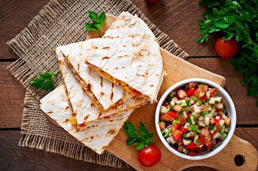 Mexican Quesadilla wrap with chicken, corn and salsa