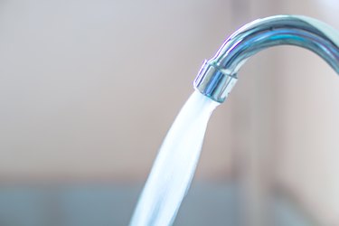 closeup  water running from faucet